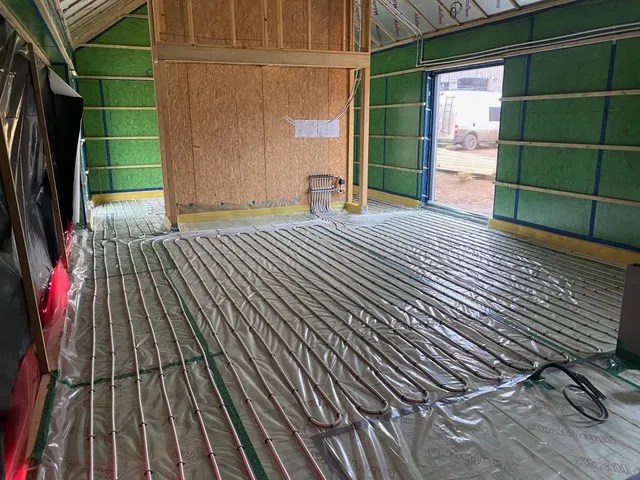Underfloor heating, pipes clipped to insulation set at 150mm centres.