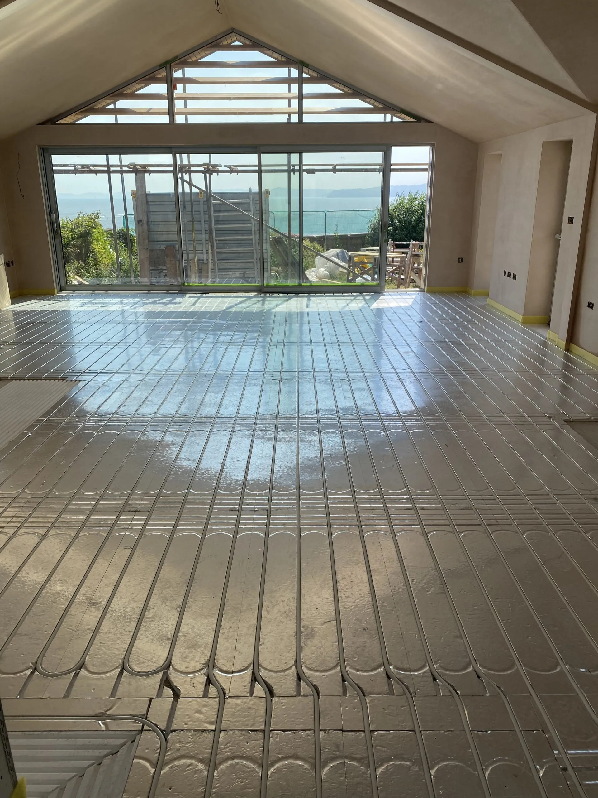 Underfloor heating using an over floor system